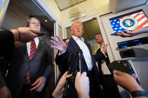 President Donald Trump, center, joined by Treasury Secretary Scott Bessent, left, and U.S. Trade Representative Jamieson Greer, right, speaks to reporters aboard Air Force One while traveling from Kuala Lumpur, Malaysia, to Tokyo, Japan, Monday, Oct. 27, 2025. (AP Photo/Mark Schiefelbein) President Donald Trump, center, joined by Treasury Secretary Scott Bessent, left, and U.S. Trade Representative Jamieson Greer, right, speaks to reporters aboard Air Force One while traveling from Kuala Lumpur, Malaysia, to Tokyo, Japan, Monday, Oct. 27, 2025. (AP Photo/Mark Schiefelbein)