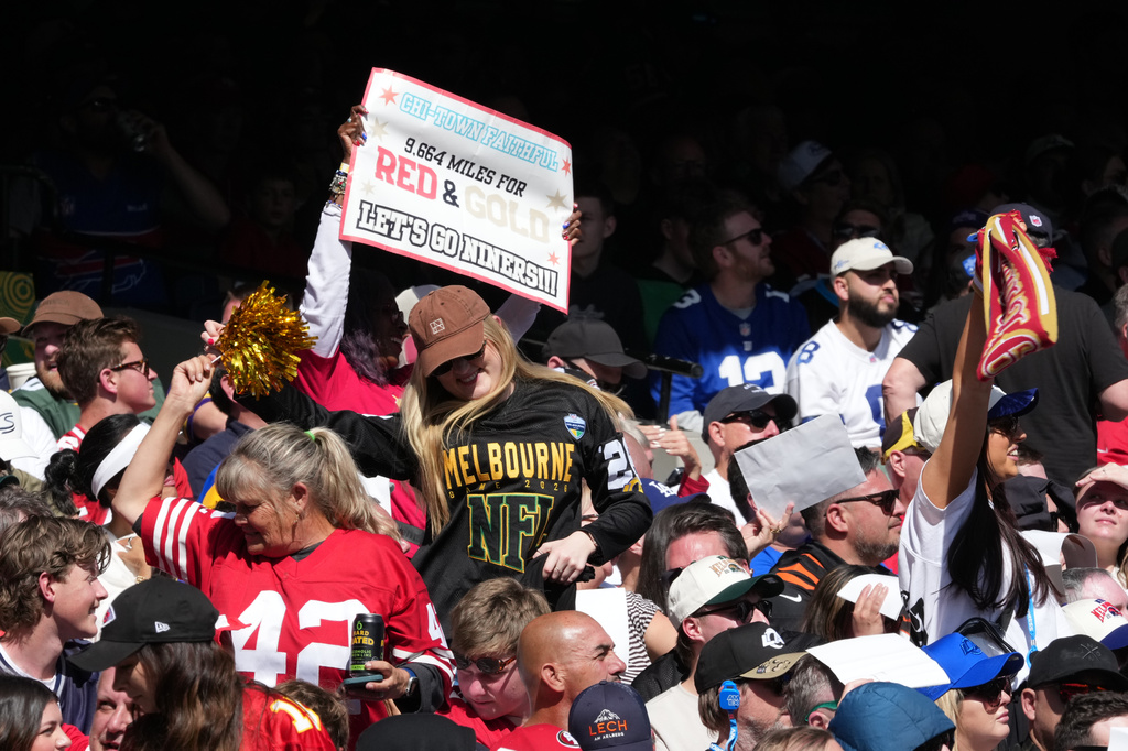 Fans cheer during the second half of an NFL football game between the Los Angeles Rams and the San Francisco 49ers, Friday, Sept. 11, 2026, in Melbourne, Australia.(AP Photo/Asanka Brendon Ratnayake)