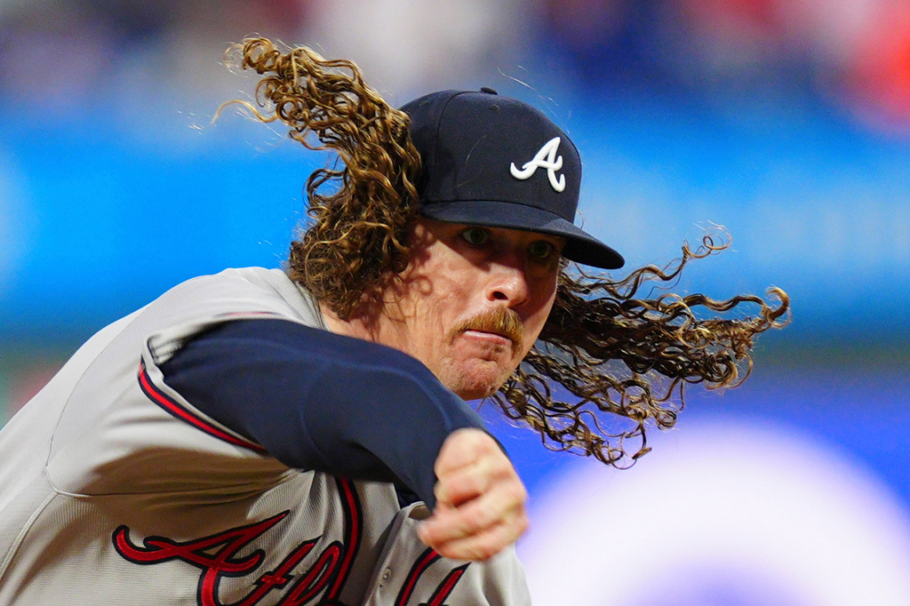 Atlanta Braves pitcher Grant Holmes throws during the first inning of a baseball game against the Philadelphia Phillies, Sunday, April 19, 2026, in Philadelphia. (AP Photo/Derik Hamilton)