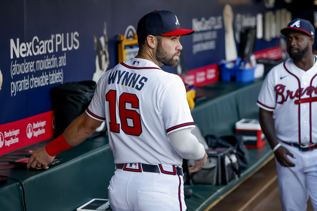 Newly acquired Atlanta Braves catcher Austin Wynns (16) stands in the dugout before a baseball game against the Toronto Blue Jays, Thursday, June 4, 2026, in Atlanta. (AP Photo/Erik S. Lesser)