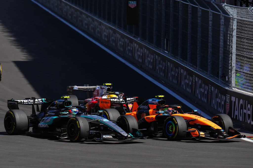 McLaren driver Lando Norris of Britain, right, and Mercedes driver Andrea Kimi Antonelli of Italy steer their cars during the Spanish Formula One Grand Prix race in Madrid, Sunday, Sept. 13, 2026. (AP Photo/Manu Fernandez)