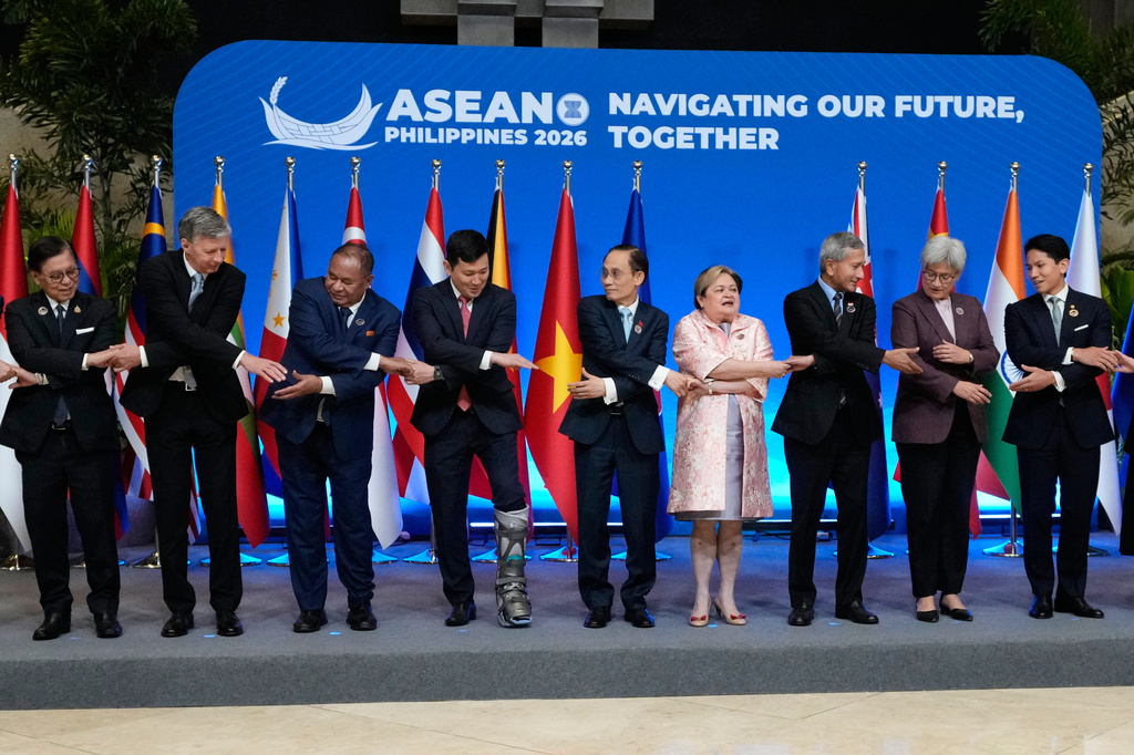 From left: Thailand's Foreign Minister Sihasak Phuangketkeow, Russia's ambassador to ASEAN Evgeny Zagaynov, Timor-Leste's Foreign Minister Bendito Santos Frietas, U.S. Ambassador to ASEAN Kevin Kim, Vietnam's Foreign Minister Le Hoai Trung, Philippine Foreign Secretary Theresa Lazaro, Singapore's Foreign Minister Vivian Balakrishnan, Australia's Foreign Minister Penny Wong and Brunei's Foreign Minister Abdul Mateen Bolkiah pose for a group photo during the Association of Southeast Asian Nations (ASEAN) Foreign Ministers' Meeting in Pasay city, Metro Manila, Philippines, Thursday, July 23, 2026. (AP Photo/Aaron Favila, Pool)