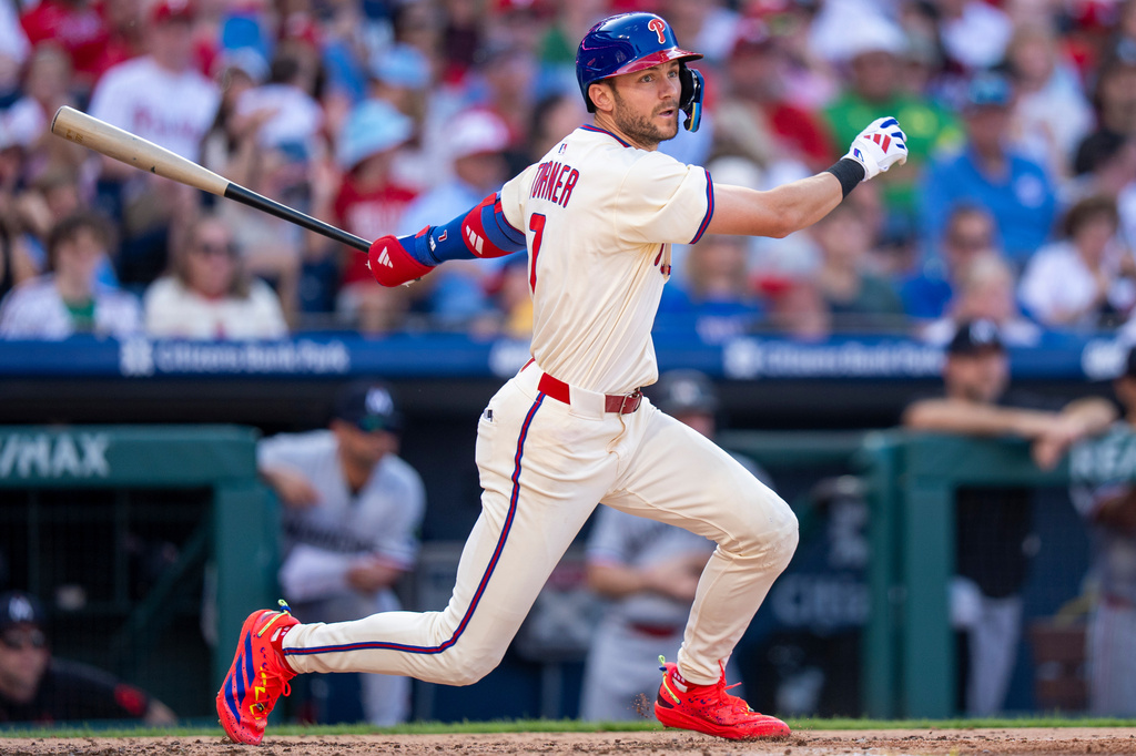 Philadelphia Phillies' Trea Turner fouls the ball off during the third inning of a baseball game against the Minnesota Twins, Sunday, Sept. 28, 2025, in Philadelphia. (AP Photo/Chris Szagola)