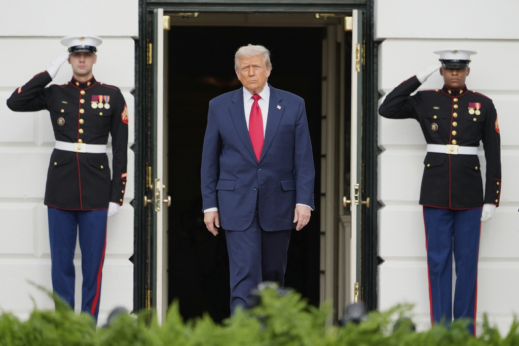 President Donald Trump waits to welcome Saudi Arabia's Crown Prince Mohammed bin Salman to the White House, Tuesday, Nov. 18, 2025, in Washington. (AP Photo/Mark Schiefelbein)