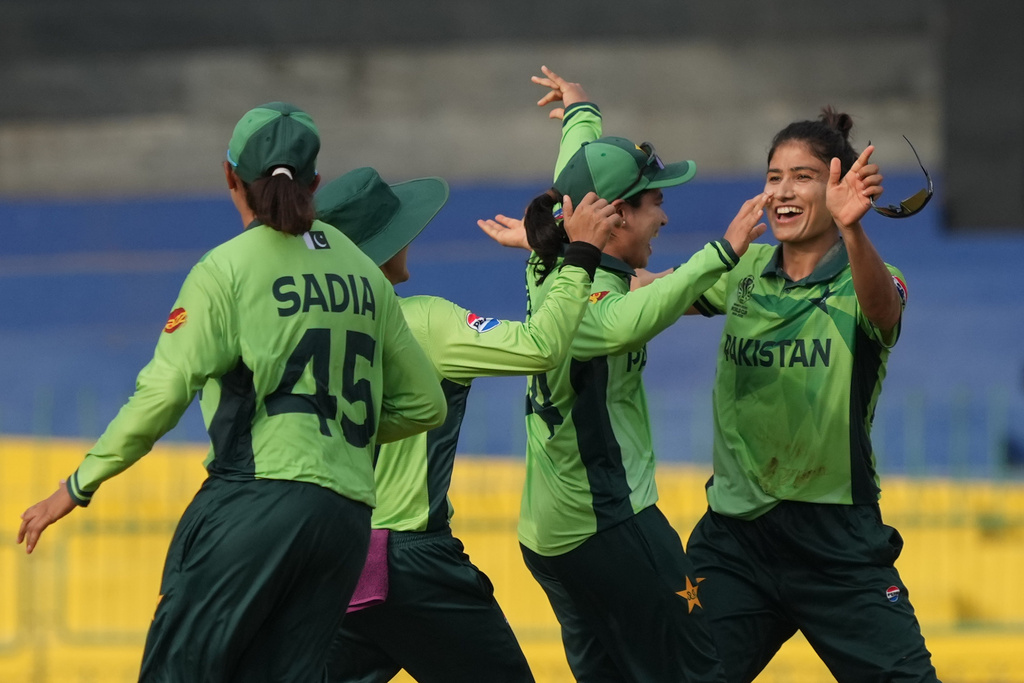 Pakistan's Nashra Sundhu celebrates the wicket of Australia's Tahlia McGrath during the ICC Women's Cricket World Cup match between Australia and Pakistan at Premadasa Stadium in Colombo, Sri Lanka, Wednesday, Oct, 8, 2025. (AP Photo/Eranga Jayawardena)