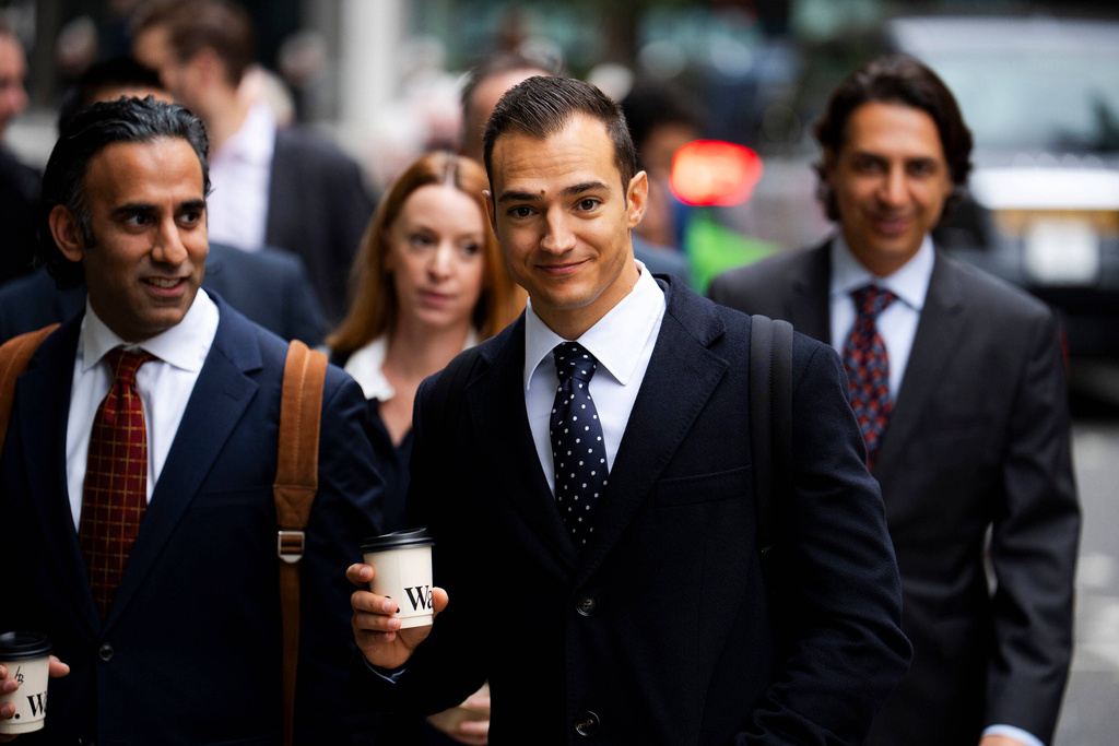 Spanish racing driver Alex Palou, arrives at the Rolls Building of the Royal Courts of Justice to give evidence in McLaren's legal claim against him, in central London, Friday, Oct. 10, 2025. (Jordan Pettitt/PA via AP)