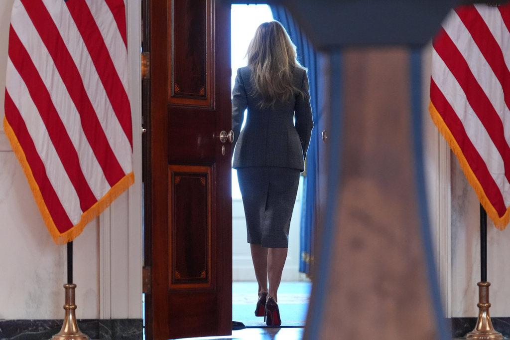 First lady Melania Trump departs after speaking with reporters Thursday, April 9, 2026, in the Grand Foyer of the White House in Washington. (AP Photo/Jacquelyn Martin)
