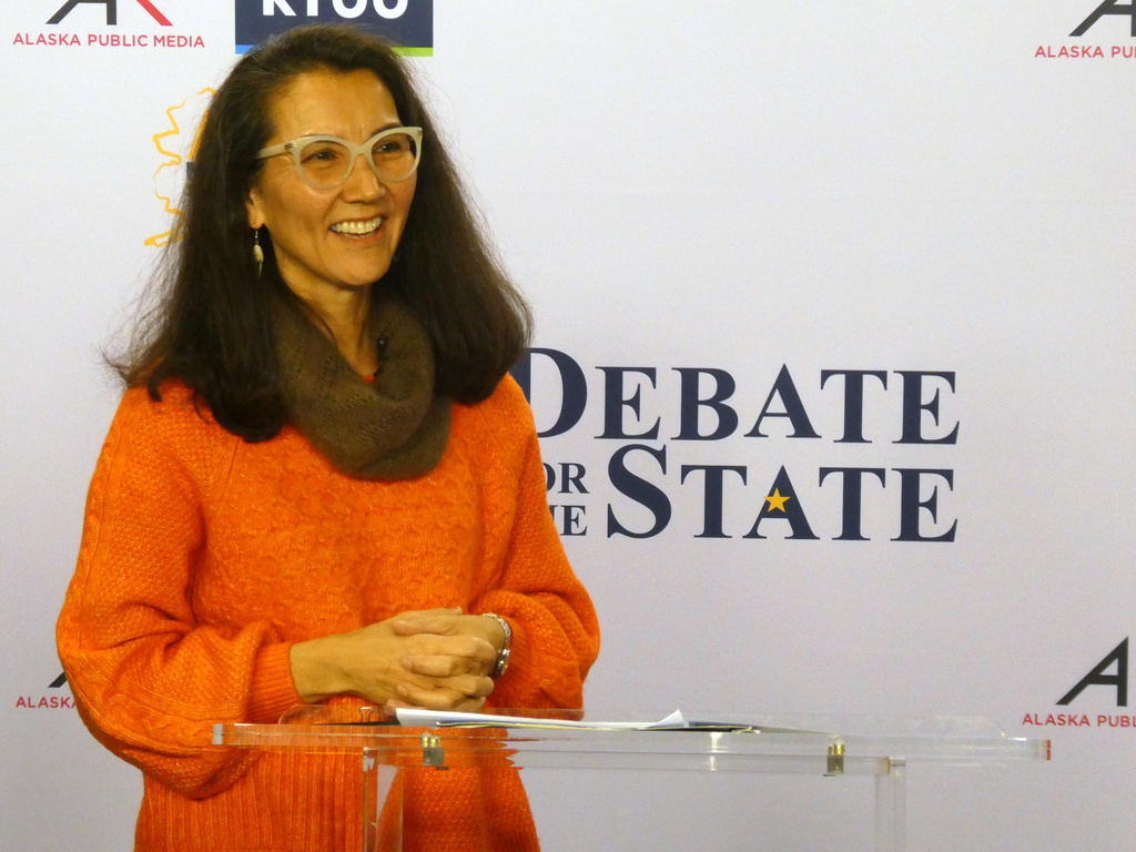 In this photo shot with a smart phone, Democrat Mary Peltola smiles ahead of a debate with Republican U.S. Sen. Dan Sullivan in Alaska's Senate race, Thursday, Oct. 15, 2026, in Anchorage, Alaska. (AP Photo/Becky Bohrer)
