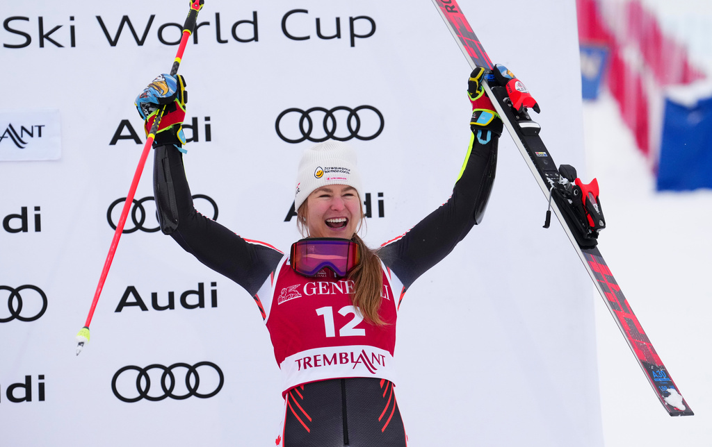 Valerie Grenier, of Canada, celebrates a third place finish in the women's World Cup giant slalom in Mont Tremblant, Quebec, Saturday, Dec. 6, 2025. (Sean Kilpatrick/The Canadian Press via AP)