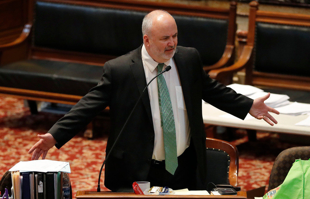 FILE - Sen. Jim Carlin, R-Sioux City, speaks during debate on the tax bill in the Iowa Senate, May 5, 2018, at the Statehouse in Des Moines, Iowa. (AP Photo/Charlie Neibergall, File)