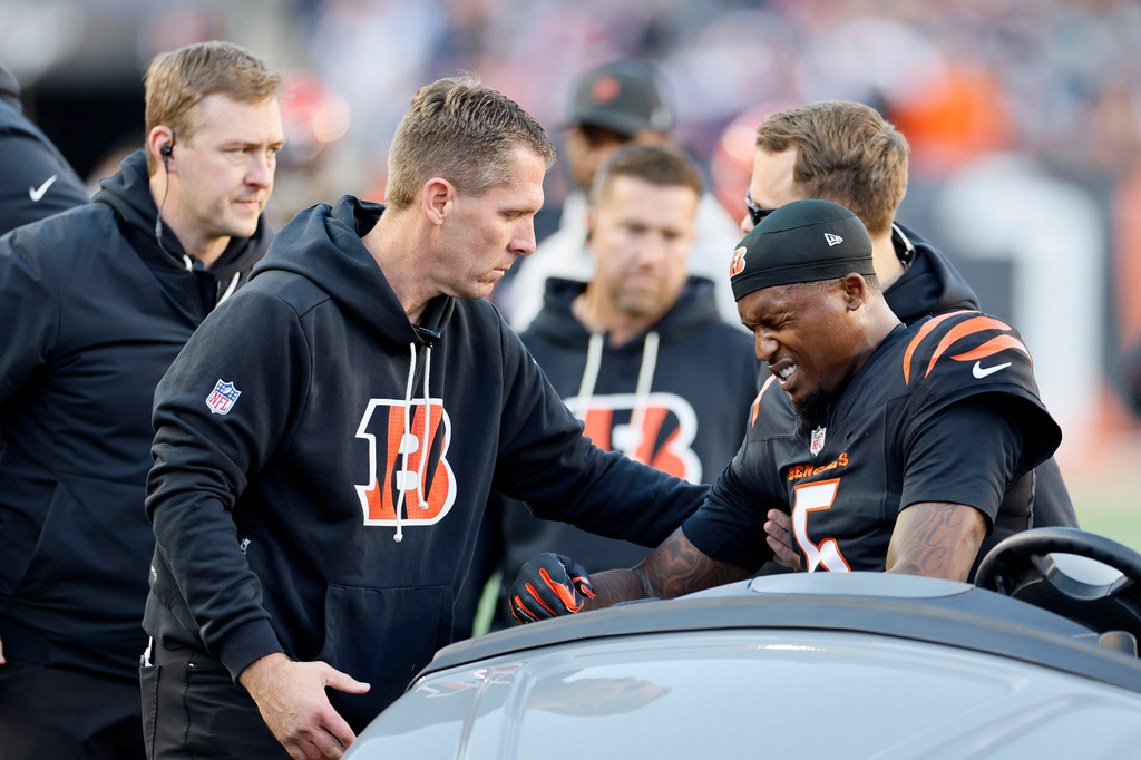 FILE - Cincinnati Bengals wide receiver Tee Higgins is carted off the field after getting injured during the second half of an NFL football game against the New England Patriots, Sunday, Nov. 23, 2025, in Cincinnati. (AP Photo/Jay LaPrete, file)
