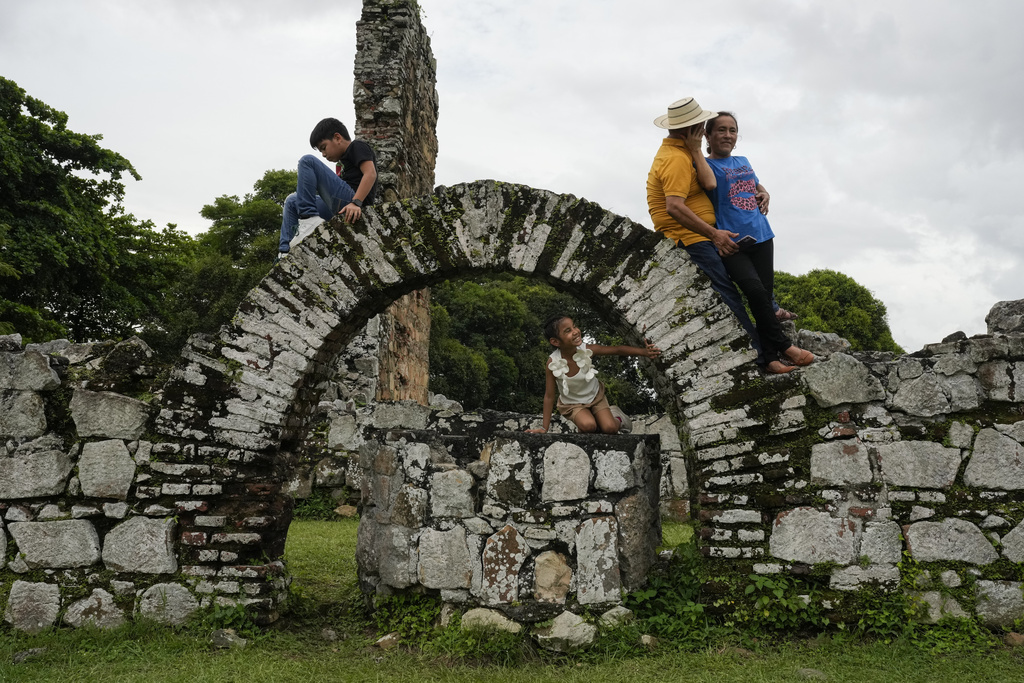 Visitors tour the ruins of Old Panama, the city's first colonial settlement founded in 1519 by Spanish conqueror Pedro Arias de Avila, in Panama City, Friday, Aug. 15, 2025.(AP Photo/Matias Delacroix)