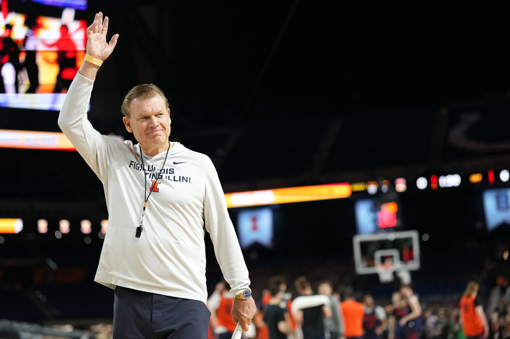 FILE - Illinois head coach Brad Underwood waves during practice ahead of a national semifinal NCAA college basketball tournament game against UConn at the Final Four, April 3, 2026, in Indianapolis. (AP Photo/Abbie Parr, File)