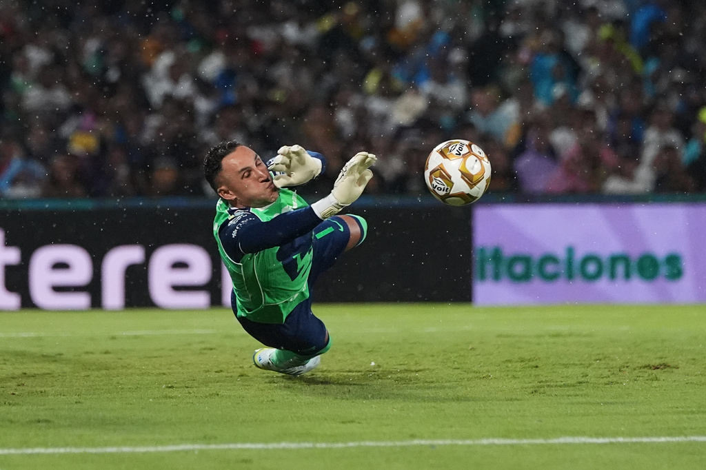 Pumas' goalkeeper Keylor Navas makes a save against Cruz Azul during the Mexican soccer league second leg final match in Mexico City, Sunday, May 24, 2026. (AP Photo/Eduardo Verdugo)