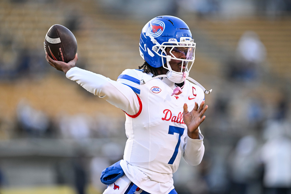 FILE - SMU quarterback Kevin Jennings (7) warms up before a NCAA college football game against California, Nov. 29, 2025, in Berkeley, Calif. (AP Photo/Justine Willard, File)