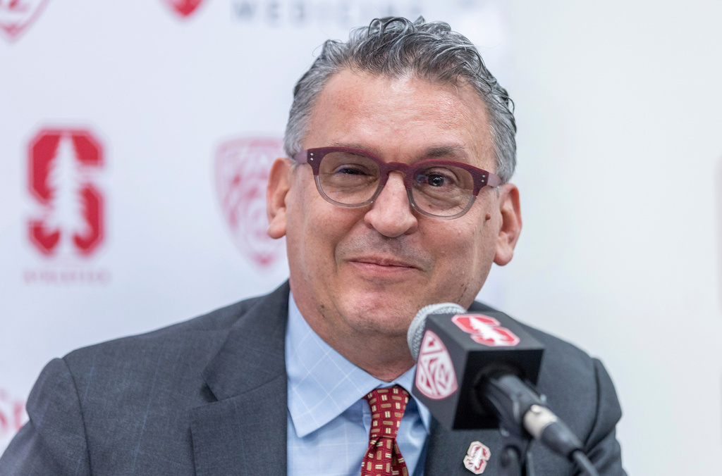 FILE - Kyle Smith smiles as he is introduced as Stanford's new men's basketball coach during a news conference, March 27, 2024, in Stanford, Calif. (Karl Mondon/Bay Area News Group via AP, File)