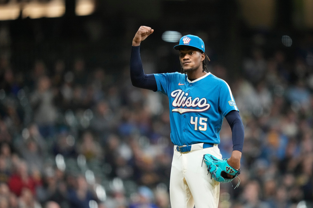 Milwaukee Brewers pitcher Abner Uribe reacts to a strikeout during the eighth inning of a baseball game against the Washington Nationals, Friday, April 10, 2026, in Milwaukee. (AP Photo/Kayla Wolf)