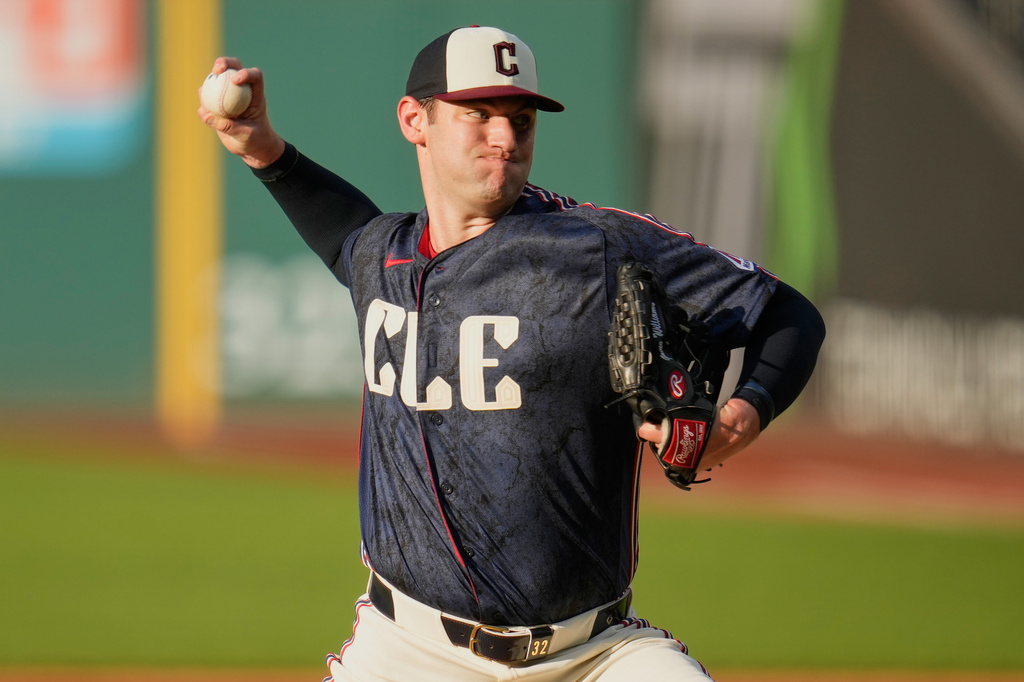 Cleveland Guardians' Gavin Williams pitches in the first inning of a baseball game against the Chicago White Sox in Cleveland, Friday, July 3, 2026. (AP Photo/Sue Ogrocki)