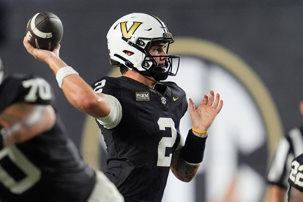 Vanderbilt quarterback Jared Curtis (2) looks to throw a pass during the second half of an NCAA college football game against Austin Peay, Saturday, Sept. 5, 2026, in Nashville, Tenn. (AP Photo/George Walker IV)