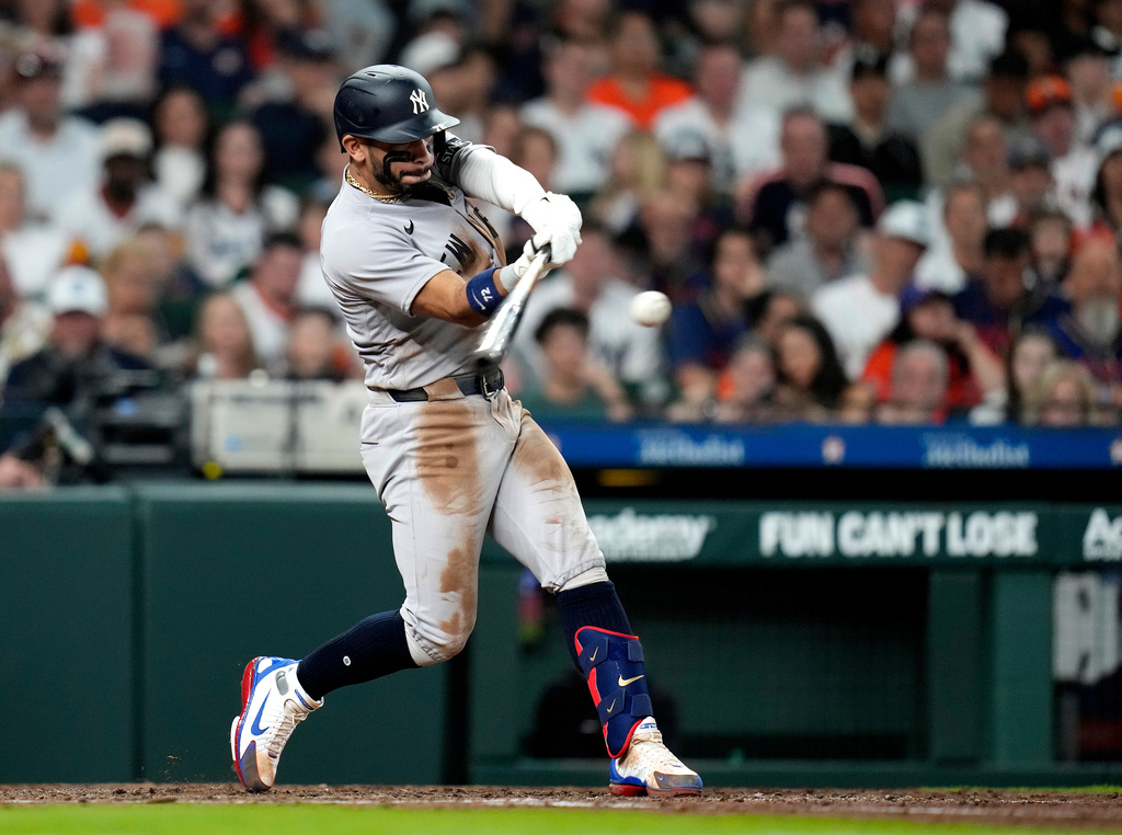 New York Yankees' José Caballero (72) hits a solo home run against Houston Astros starting pitcher Mike Burrows during the fifth inning of a baseball game, Saturday, April 25, 2026, in Houston. (AP Photo/Karen Warren)