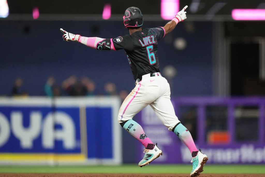 Miami Marlins' Otto Lopez (6) runs the bases after hitting a two run home run during the sixth inning of a baseball game against the Milwaukee Brewers, Friday, April 17, 2026, in Miami. (AP Photo/Lynne Sladky)