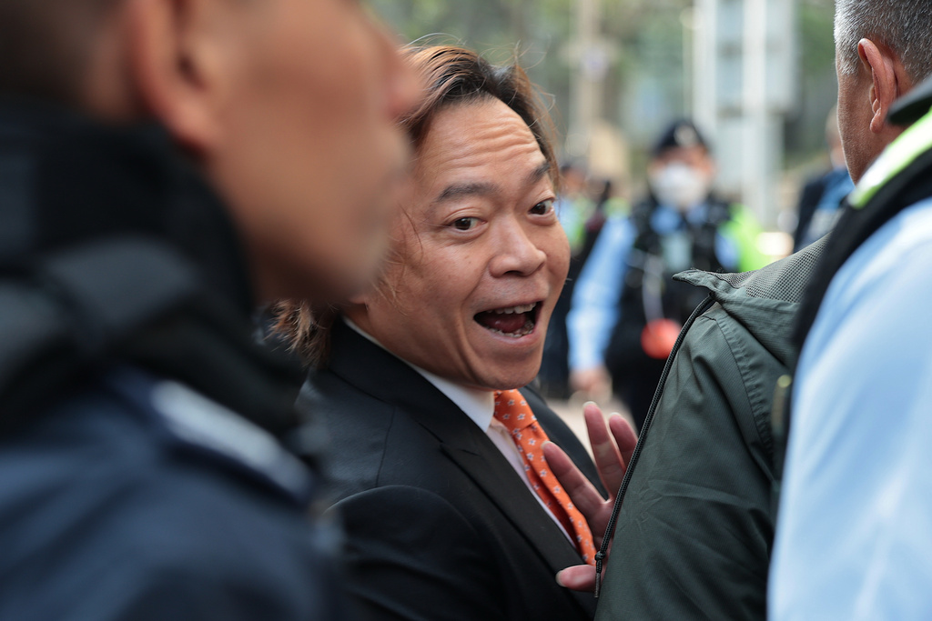 Pro-democracy activist Lawrence Lau Wai-chung arrives at the West Kowloon Law Courts Building ahead of the national security appeal cases, in Hong Kong, Monday, Feb. 23, 2026. (AP Photo/May James)