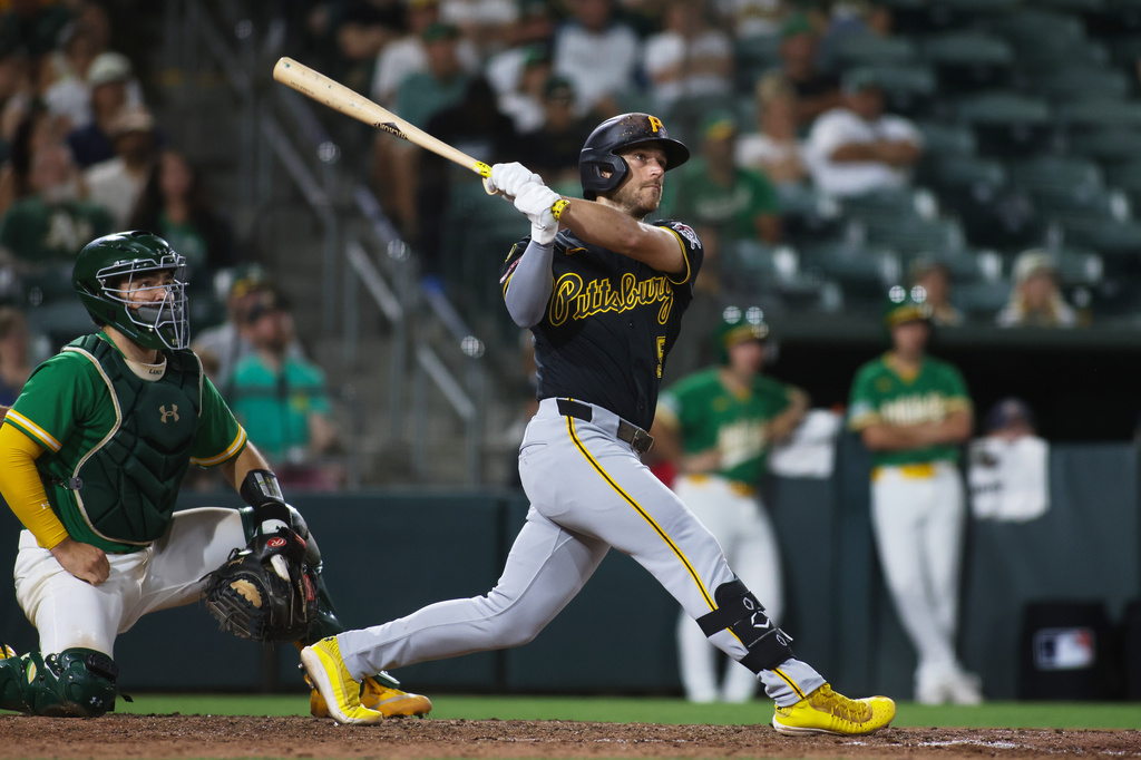 Pittsburgh Pirates' Brandon Lowe hits a solo home run during the ninth inning of a baseball game against the Athletics, Tuesday, June 16, 2026, in West Sacramento, Calif. (AP Photo/Scott Marshall)