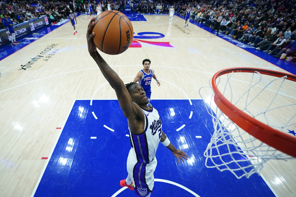 Sacramento Kings' Keon Ellis goes up for a dunk during the second half of an NBA basketball game against the Philadelphia 76ers Thursday, Jan. 29, 2026, in Philadelphia. (AP Photo/Matt Slocum)