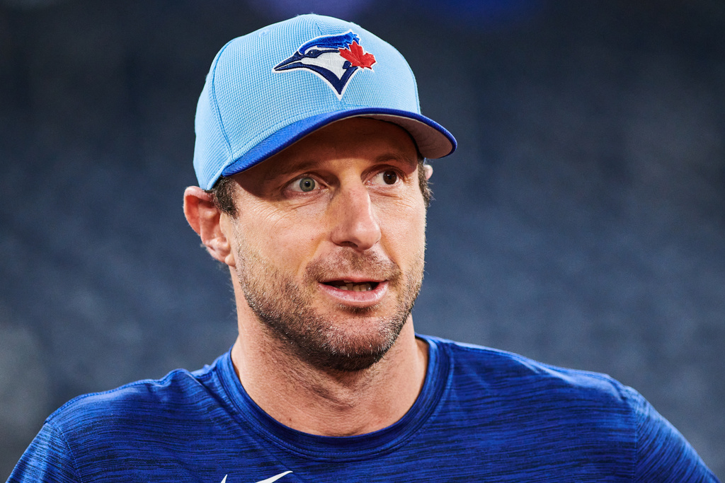 Toronto Blue Jays' Max Scherzer (31) looks on before batting practice Saturday, Oct. 18, 2025, in Toronto, ahead of Sunday's Game 6 in baseball's American League Championship Series against the Seattle Mariners. (Sammy Kogan/The Canadian Press via AP)