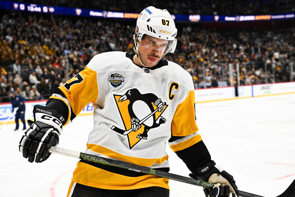 Pittsburgh Penguins' Sidney Crosby skates during a break in a NHL Global Series hockey game against the Nashville Predators, Friday, Nov. 14, 2025, in Stockholm, Sweden. (Henrik Montgomery/TT News Agency via AP)