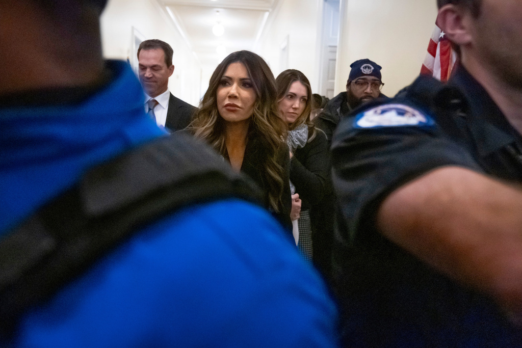 Homeland Security Secretary Kristi Noem leaves a hearing of the House Committee on Homeland Security on Capitol Hill in Washington, Thursday, Dec. 11, 2025. (AP Photo/Mark Schiefelbein)