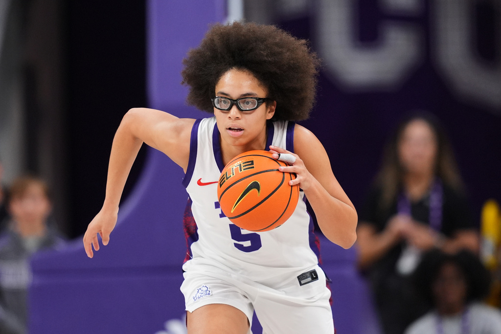 TCU guard Olivia Miles advances the ball against Arkansas Pine Bluff during an NCAA college basketball game in Fort Worth, Texas, Tuesday, Dec. 16, 2025. (AP Photo/Tony Gutierrez)