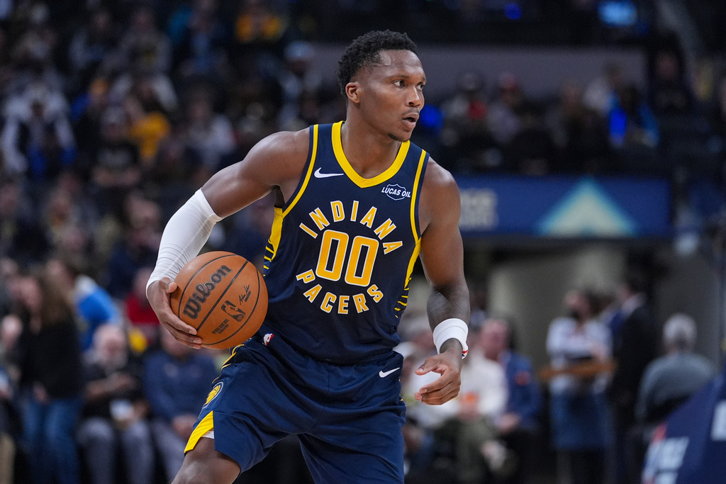 Indiana Pacers forward Bennedict Mathurin (00) plays against the Charlotte Hornets during the second half of an NBA basketball game in Indianapolis, Wednesday, Nov. 19, 2025. (AP Photo/Michael Conroy)