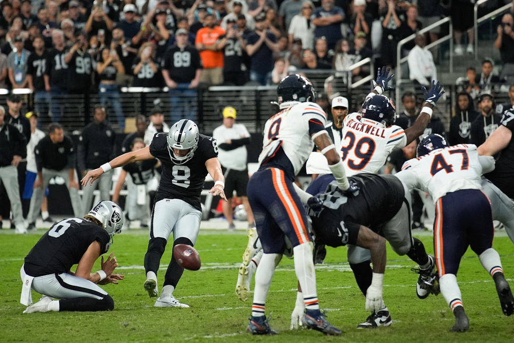 Chicago Bears cornerback Josh Blackwell (39) moves to block a field goal attempt by Las Vegas Raiders kicker Daniel Carlson (8) during the second half of an NFL football game Sunday, Sept. 28, 2025, in Las Vegas. (AP Photo/John Locher)
