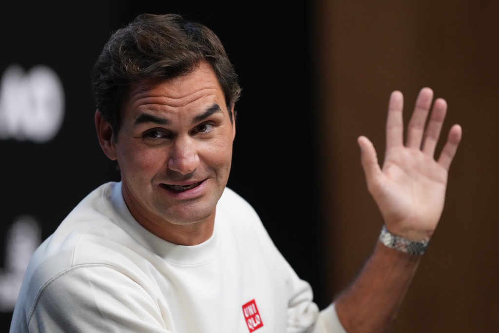 Roger Federer of Switzerland gestures during a press conference ahead of the Australian Open tennis championship in Melbourne, Australia, Thursday, Jan. 15, 2026. (AP Photo/Mark Baker)