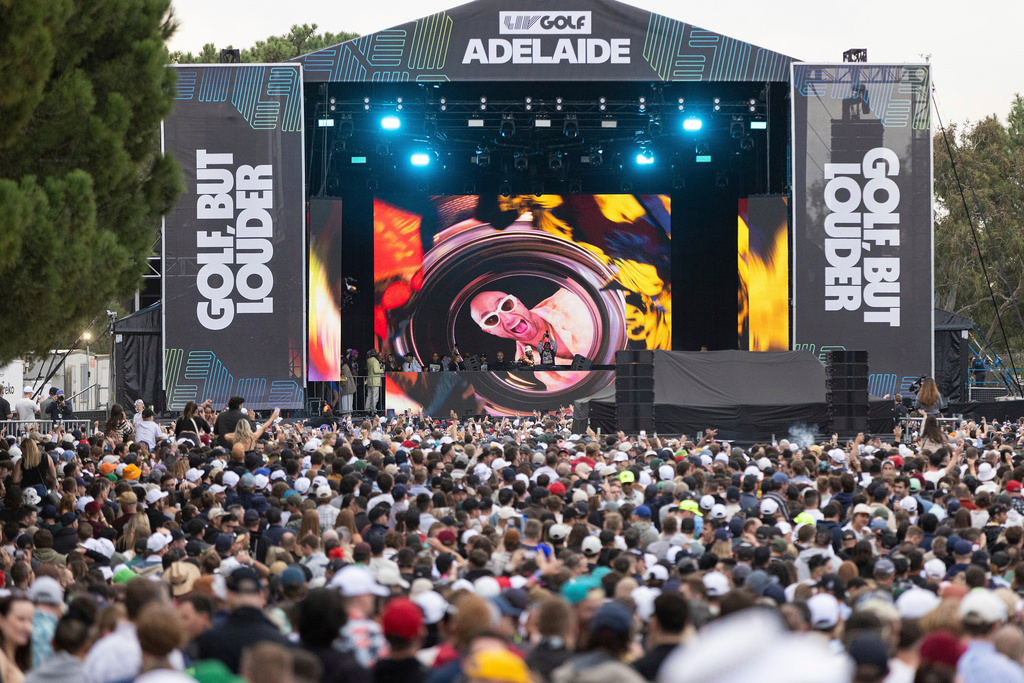 FILE - Fisher performs in fan village after the second round of LIV Golf Adelaide at the Grange Golf Club, April 27, 2024, in Adelaide, Australia. (Matt Turner/LIV Golf via AP, File)