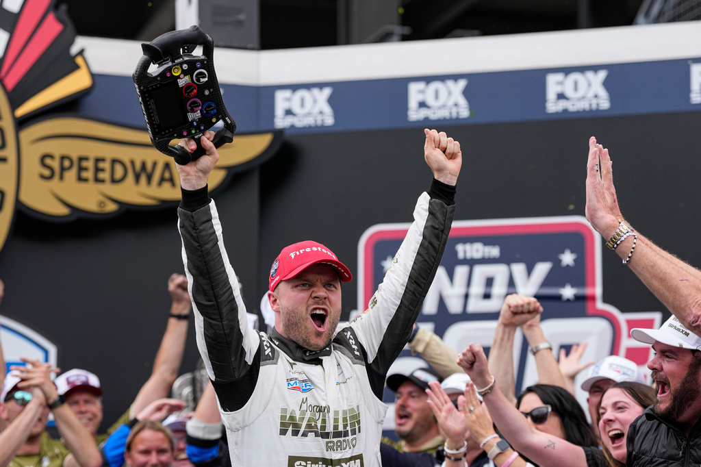 FILE - Felix Rosenqvist, center, of Sweden, celebrates after winning the Indianapolis 500 auto race at Indianapolis Motor Speedway in Indianapolis, May 24, 2026. (AP Photo/Michael Conroy, File)