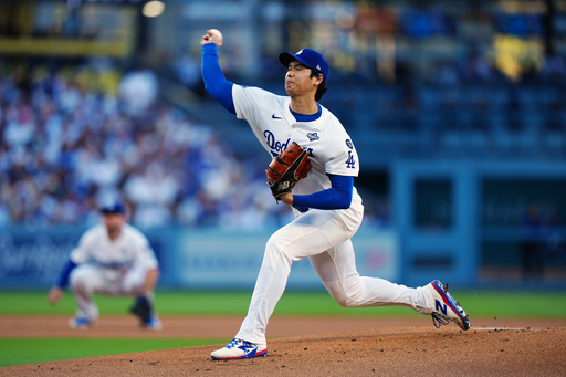 Los Angeles Dodgers pitcher Shohei Ohtani (17) throws against the Toronto Blue Jays during the first inning in Game 4 of baseball's World Series in Los Angeles, Tuesday, Oct. 28, 2025. (Frank Gunn/The Canadian Press via AP) Los Angeles Dodgers pitcher Shohei Ohtani (17) throws against the Toronto Blue Jays during the first inning in Game 4 of baseball's World Series in Los Angeles, Tuesday, Oct. 28, 2025. (Frank Gunn/The Canadian Press via AP)