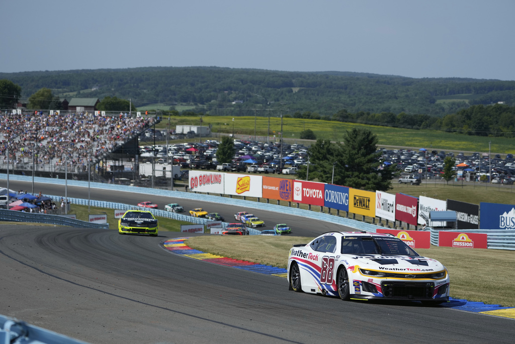 Shane van Gisbergen (88) drives through the Esses during a NASCAR Cup Series auto race in Watkins Glen, N.Y., Sunday, Aug. 10, 2025. (AP Photo/Seth Wenig)