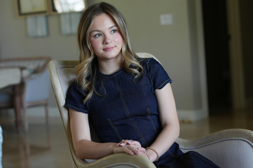 Lauryn Muller sits at her home Monday, April 13, 2026, in Coral Springs, Fla. (AP Photo/Marta Lavandier)