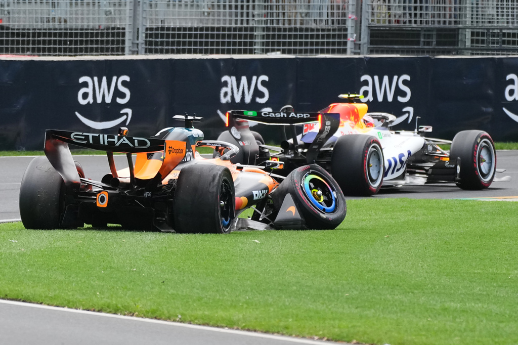 McLaren driver Oscar Piastri of Australia's car sits on the track after he crashed during the formation lap ahead of the Australian Formula One Grand Prix at Albert Park, in Melbourne, Australia, Sunday, March 8, 2026. (AP Photo/Scott Barbour)