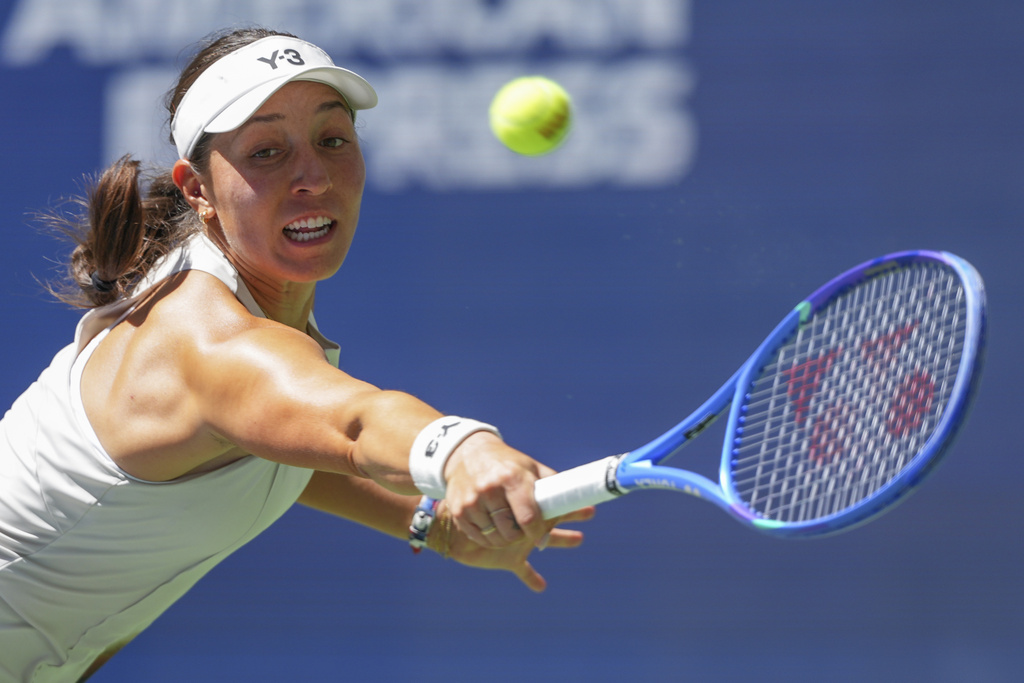 Jessica Pegula, of the United States, returns a shot to Barbora Krejcikova, of the Czech Republic, during the quarterfinal round of the US Open tennis championships, Tuesday, Sept. 2, 2025, in New York. (AP Photo/Kirsty Wigglesworth)
