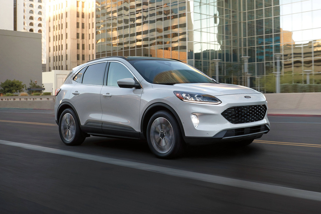 This photo provided by Ford shows the Escape, a compact SUV available as a hybrid on the used market for less than $25,000. (Courtesy of Ford Motor Co. via AP)