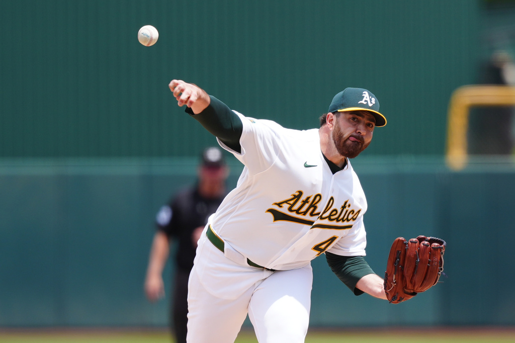 Athletics pitcher Aaron Civale throws a pitch in the first inning of a baseball game against the Cleveland Guardians, Sunday, May 3, 2026, in West Sacramento, Calif. (AP Photo/Alan Greth)