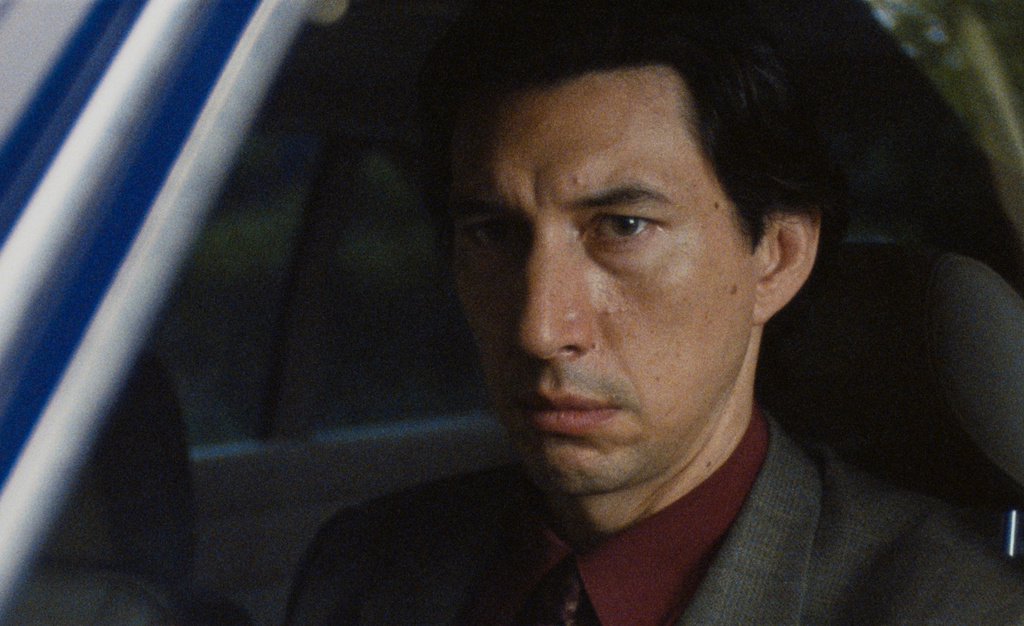 This image released by Neon shows Adam Driver in a scene from "Paper Tiger." (Neon via AP)