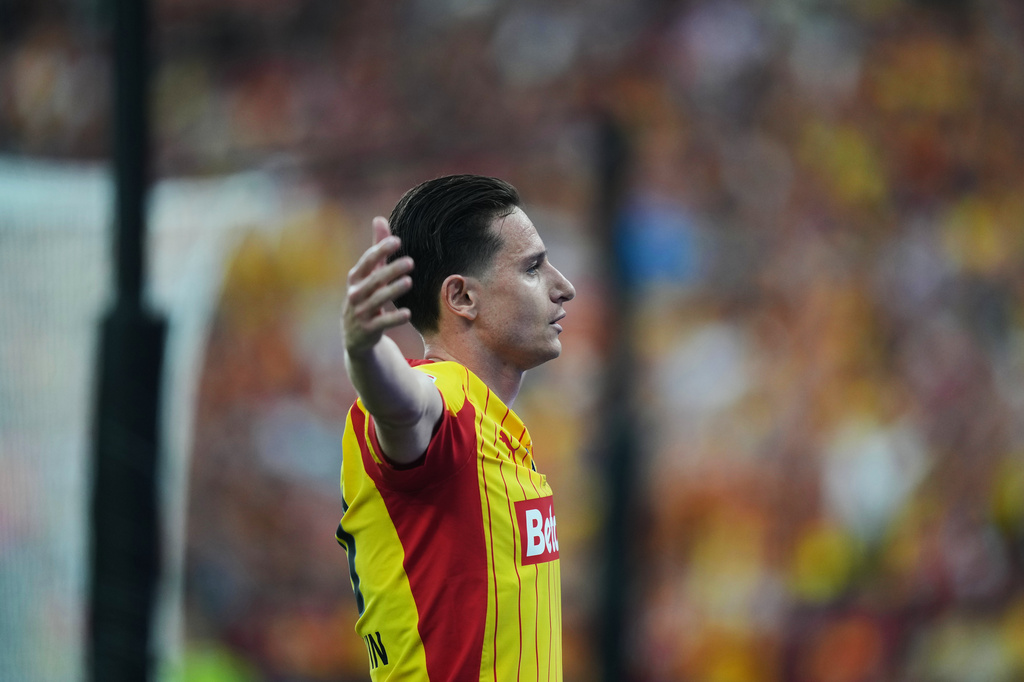 Lens' Florian Thauvin celebrates after scoring during the French Cup soccer final between Nice and Lens in Saint-Denis, outside Paris, Friday, May 22, 2026. (AP Photo/Thibault Camus)
