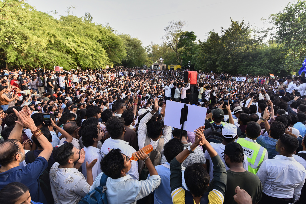 Protesters shout slogans during a nationwide protest campaign launched by Abhijeet Dipke, founder of the Cockroach Janta Party, in Pune, India, Thursday, June 11, 2026. (AP Photo/Mahendra Kolhe)