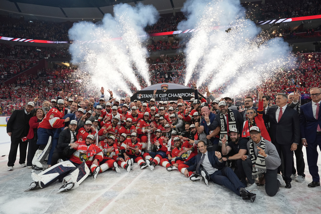 FILE - The Florida Panthers team poses with the Stanley Cup trophy after defeating the Edmonton Oilers in Game 6 of the NHL hockey Stanley Cup Final, June 17, 2025, in Sunrise, Fla. (AP Photo/Lynne Sladky, File)
