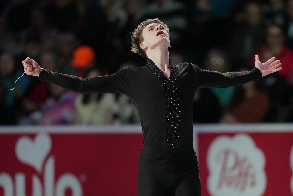 Maxim Naumov skates during the "Making Team USA" performance at the U.S. Figure Skating Championships, Sunday, Jan. 11, 2026, in St. Louis. (AP Photo/Stephanie Scarbrough)