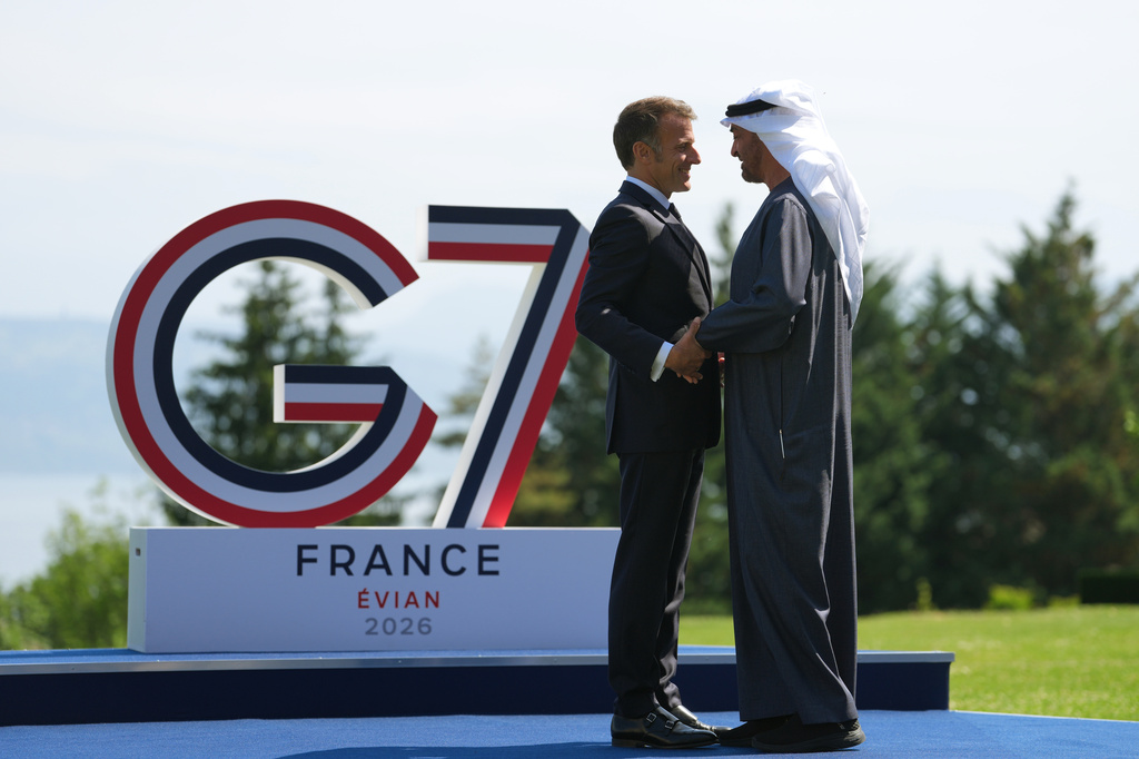 French President Emmanuel Macron, left, greets United Arab Emirates President Sheikh Mohammed bin Zayed Al Nahyan as he arrives for the G7 summit in Evian-les-Bains, France, Tuesday, June 16, 2026. (AP Photo/Thibault Camus)